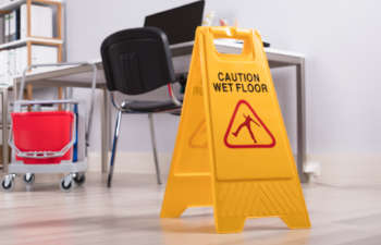 Caution Wet Floor Sign on the Office Floor