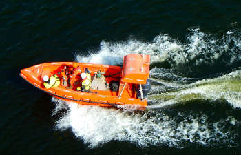 people on a speedboat