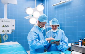 two surgeons in an operating theater