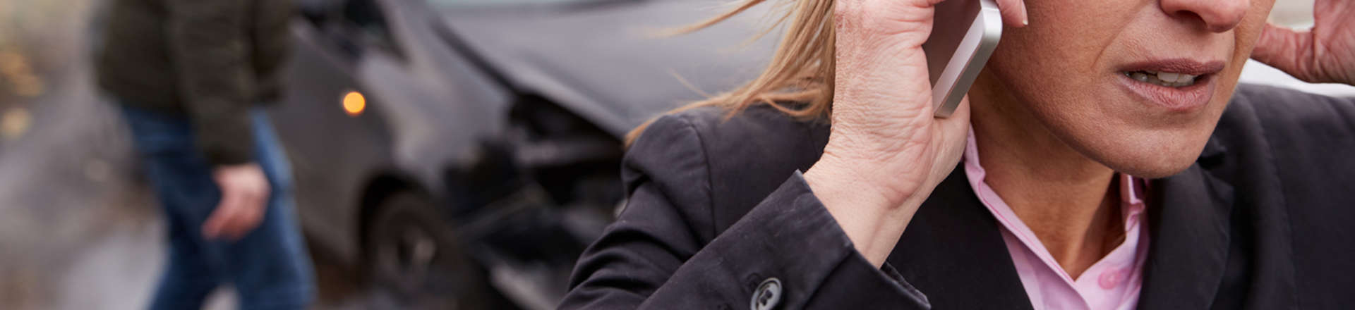 woman calling an attorney after a car accident