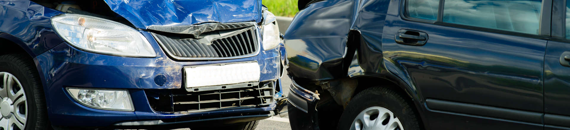 two wrecked cars after collision