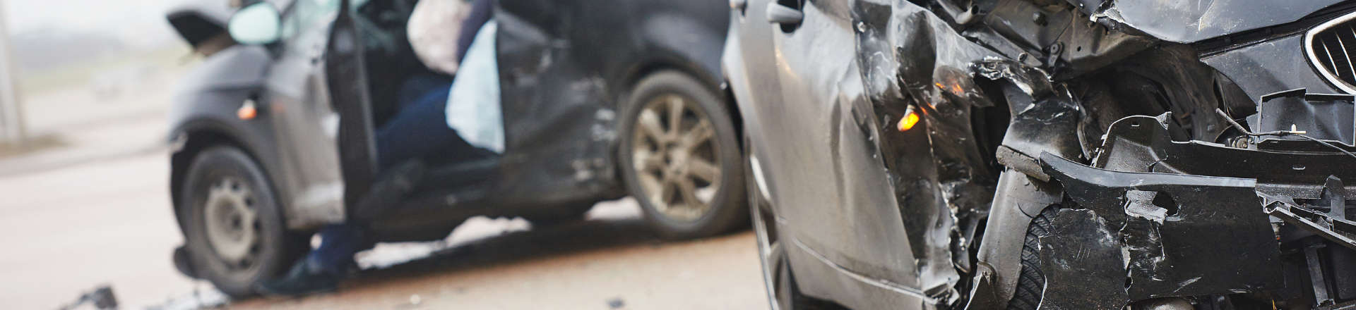 two wrecked cars after collision