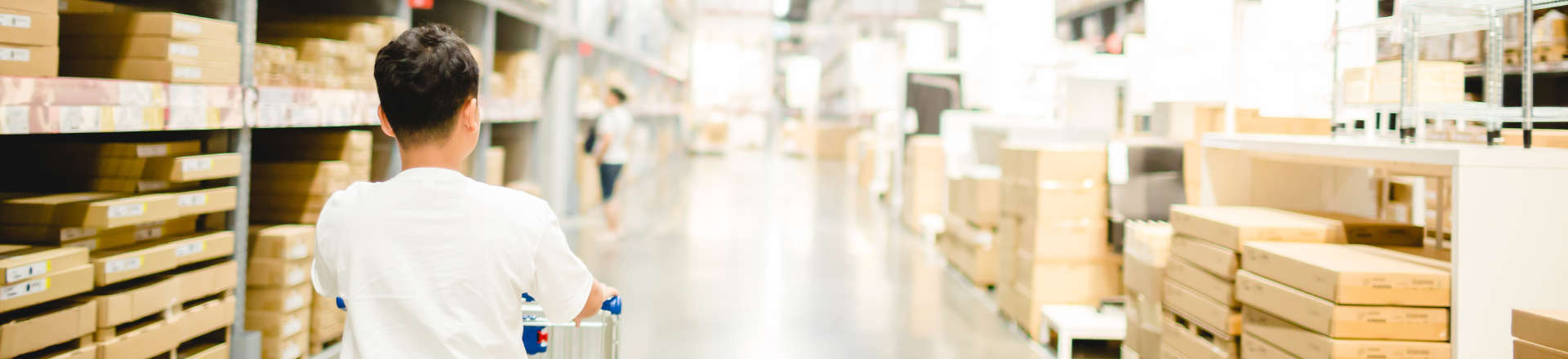 buyers moving around high shelves with merchendise