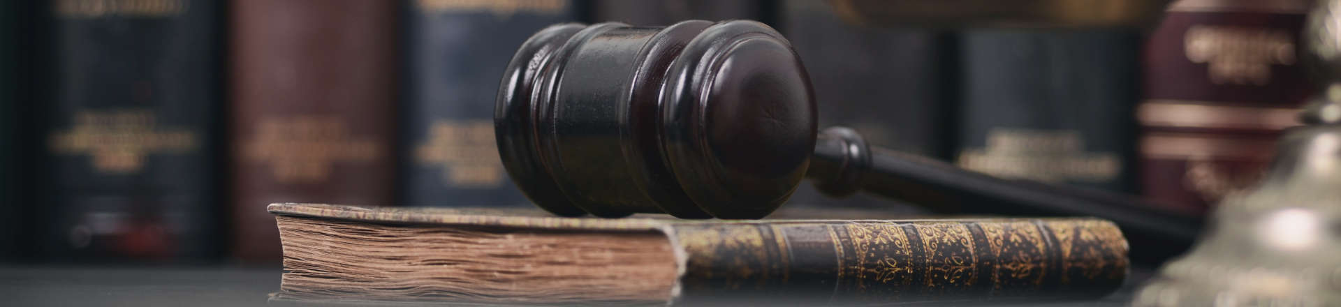 judge's gavel on an old book