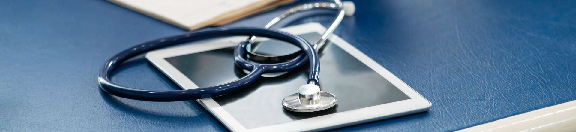 a stethoscope and a tablet