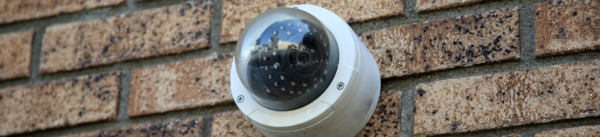 security camera installed on a building wall