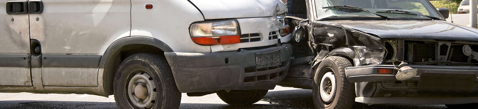 two wrecked cars after collision