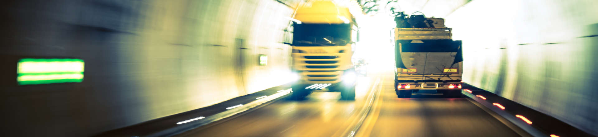 a speeding truck going through a tunnel