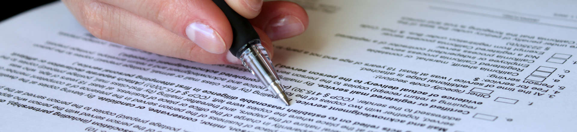 a person reading the agreement points