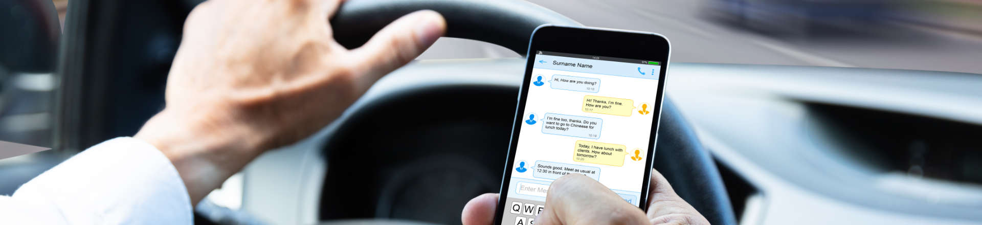 a person texting while driving