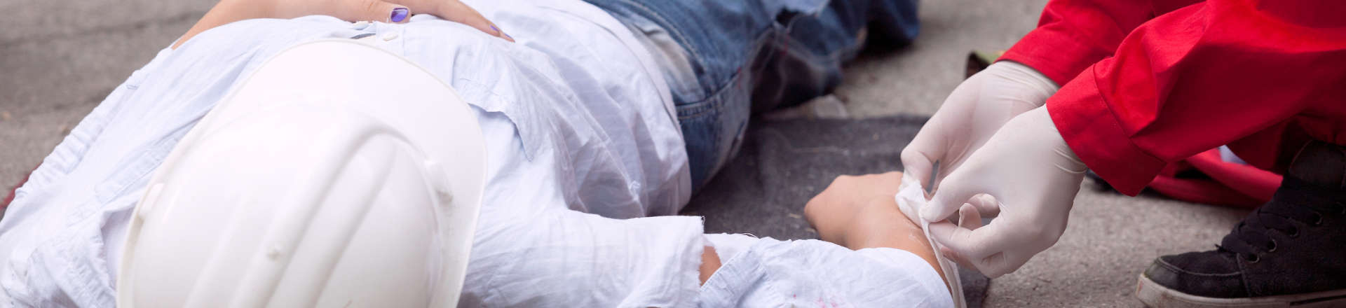 an injured worker being given first aid